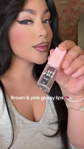 Midnight magic as my middle shade SLAYS! And it’s a stain! This whole combo is chefs kiss #lipcombo #glossylips #beauty #makeup 