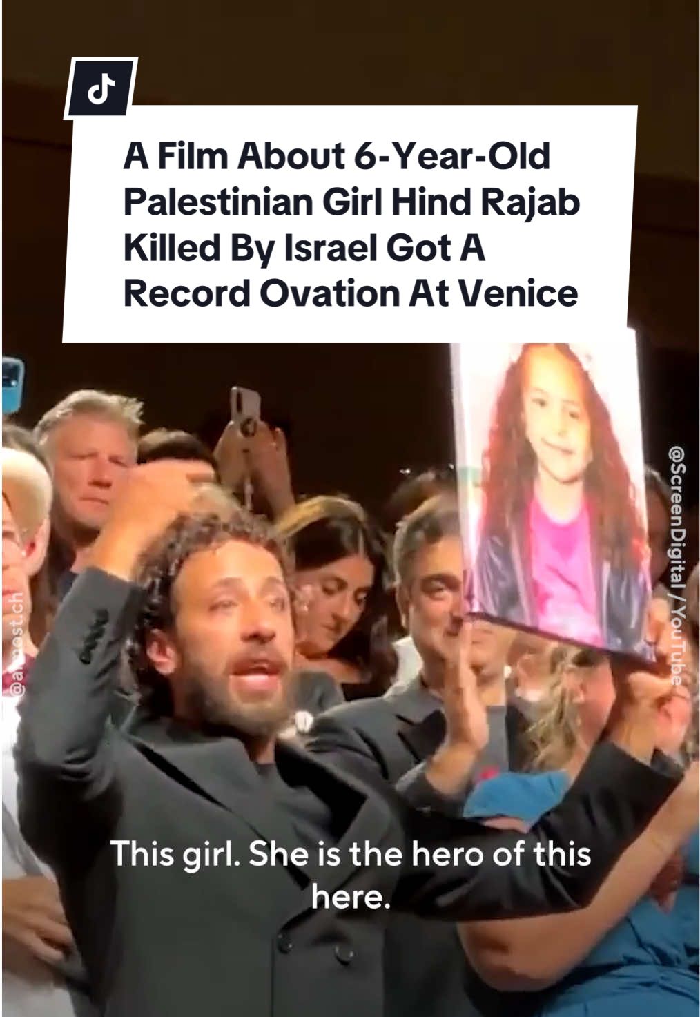 A film based on the true story of Israeli forces’ killing of six-year-old Palestinian girl Hind Rajab in Gaza received the longest standing ovation in Venice Film Festival’s history, lasting nearly 24 minutes and filling the cinema with applause and “Free Palestine” chants. Directed by Tunisian filmmaker Kaouther Ben Hania, “The Voice of Hind Rajab” reenacts the final hours of six-year-old Palestinian girl Hind Rajab, who was killed when Israeli forces attacked her family’s car and shot at it 355 times. Hind and her extended family had been fleeing Gaza on Jan. 20, when Israeli forces started shooting at their car. Her cousin, 15-year-old Layan Hamadeh, the only survivor in the car with Hind at the time, then called the Palestinian Red Crescent for help, saying “They are shooting at us. The tank is next to me,” before gunshots could be heard and Layan started screaming. In the final moments that Layan’s voice is heard, a total of 64 gunshots can be heard, fired in just six seconds, according to an analysis of the recording by Earshot. The line then went silent before Hind could be heard asking Red Crescent workers to get her because she was scared. For three hours, Hind remained on the call, trapped in the car among the bodies of her dead relatives, as Israeli forces continued to shoot around her. After the Red Crescent pinpointed her location, they sent an ambulance to rescue her, but then lost contact with the ambulance crew. Hind’s body was found 12 days later Feb. 10, 2024, decomposing in the car with her relatives’ bodies, with the ambulance crew’s bodies also found just meters away from the car. Investigations had later found that Israeli forces had shot at Hind’s family car a total of 355 bullets, knowing there were children inside. The film premiered at the Venice Film Festival on Wednesday, Sept. 3, using a recording of Hind’s real voice from her call to the Palestinian Red Crescent. The audience stood up for 23 minutes and 50 seconds, applauding, chanting “Free Palestine” and waving Palestine flags. Ben Hania said Hind’s voice was “the voice of Gaza asking for help.” Actor Saja Kilani told reporters the story was meant to make people ask why a child had to beg the world for life. Hind’s mother said she hoped the film would push leaders to end the war. The film’s executive producers include Brad Pitt, Joaquin Phoenix, Rooney Mara, Alfonso Cuarón and Jonathan Glazer. It is Tunisia’s official entry for the Academy Awards and is now considered one of the strongest competitors for Venice’s Golden Lion prize, which will be awarded on Sept. 6. Israel has now killed more than 64,231 Palestinians in Gaza, mostly women and children, and Gaza City is officially in a man-made famine created by Israel. #venicefilmfestival #thevoiceofhindrajab #palestine #gaza #tiktoknews 