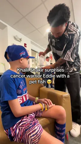 Eddie didn't want to adopt a dog at Khalil Shakir's pet adoption event, so Khalil surprised him with a fish! ❤️ #buffalobills #pediatriccancer #fish #fyp #foryoupage @Sayler Shakir 