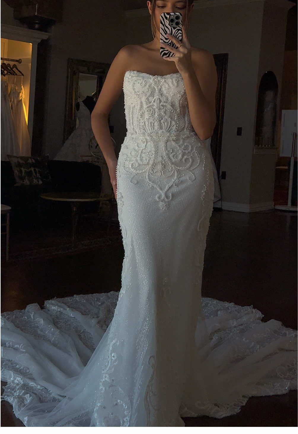 RYANN🤍 the beaded gown of every glam bride’s dreams. A stunning fit and flare gown with a long scalloped shape train, adorned with a glitter layer and hand beaded lace appliqués to make you shine✨  This wedding dress is available at our Dallas flagship store or at one of our retailers nationwide. All Elizabeth Lee dresses are able to be fully customizable and made to measure🤍 #bridalfashion #beadedweddingdress #bridaltrends #weddinginspo #weddingglam 