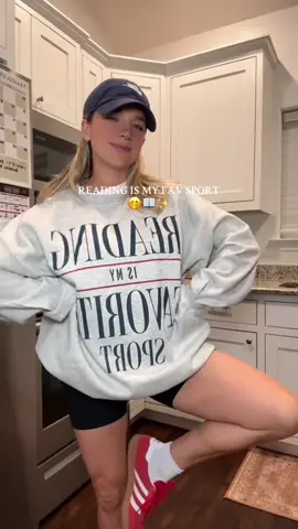 What I’ll be wearing all football season 🤗🤭🩵 #girlswhoread #momswhoread #booktokgirlies #booktokers #readingromance reading is my fav sport, I love to read, reading crewneck, book girls, kindle, let’s get coffee and read, fall outfit, mom ootd, mom fit, book recs, book girls