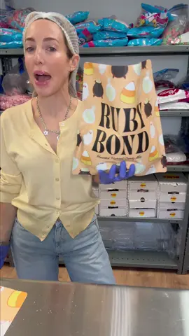 I can barely hold it up with one hand 😂😅🫠 Head to our TikTok shop to grab your #rubybond candy bag today 🍭🍬 #candy #asmr #candyshop #halloweencandy 