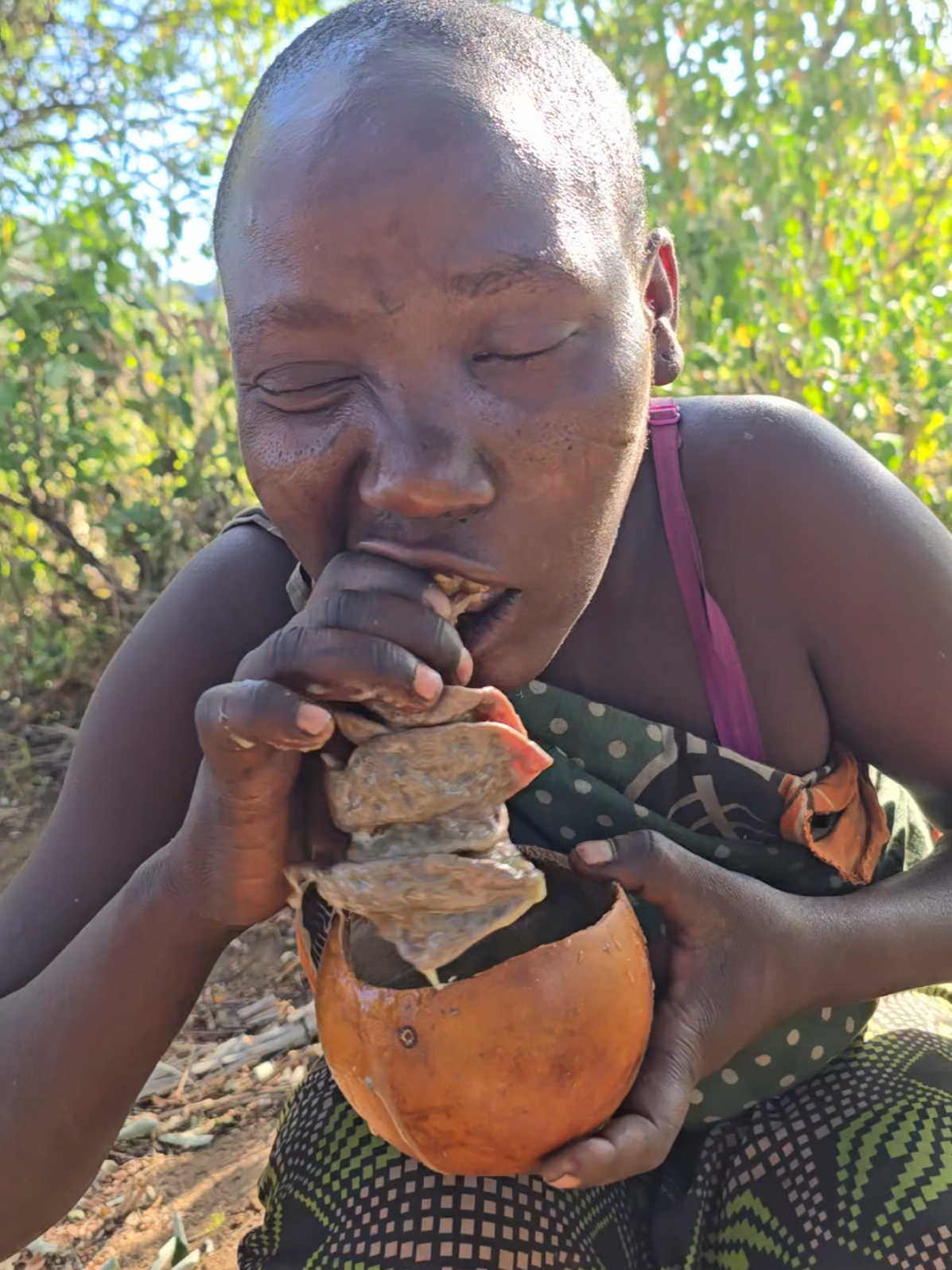 brave Hadzabe girl eating baboon intestine #reels #shorts #Foodie #FoodLover #video 
