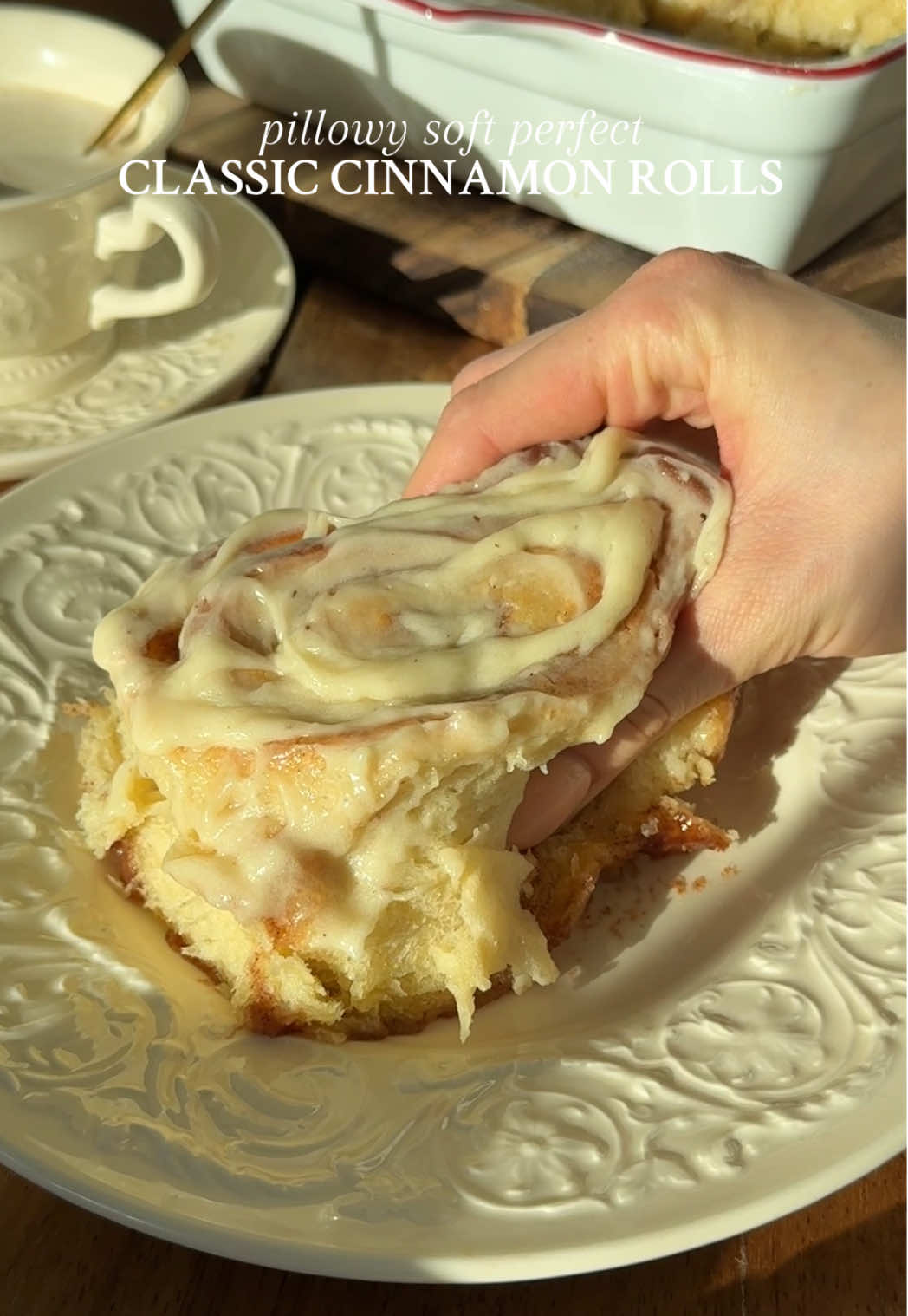 PERFECT CLASSIC CINNAMON ROLLS There’s no better cozy Saturday morning breakfast ☕️ Recipe below OR go to my website through the link in my bio 🤎 #Recipe Details (8 larger or 12 smaller rolls): Dough: - 3/4 cup (180ml) milk of choice, warmed to 110F  - 1/2 cup (110g) granulated sugar, divided - 2 1/2 tsp (11g) active dry yeast - 1/2 cup (120g) Greek yogurt or sour cream, room temp  - 1/2 cup (113g) salted butter, very softened (almost melted) - 2 eggs, room temp - 1 tsp (4g) vanilla bean paste or extract - 4 1/2 cups (540g) bread flour (sub: all-purpose flour) - 1 tsp (6g) salt Cinnamon Filling: - 1/2 cup (113g) salted butter, softened - 1 cup (240g) light brown sugar - 2 tbsp (4g) cinnamon - 1 tsp (4g) vanilla bean paste or extract - 1/2 cup (120ml) heavy cream, for pouring over the rolls Cream Cheese Frosting: - 8oz (1 block) cream cheese, softened  - 1/4 cup (58g) salted butter, softened - 1 3/4 cups (210g) powdered sugar  - 1 tsp (4g) vanilla bean paste or extract Instructions: Activate the yeast. Pour the warm milk into a small bowl or glass measuring cup. Add 1 tbsp (13g) of the granulated sugar and sprinkle the yeast overtop. Stir and allow to sit for 5-7 minutes, until frothy and activated. In a large bowl, whisk together the flour and salt. Set aside.  Once activated, pour the yeast mixture into the bowl of a stand mixer. Add the rest of the sugar (1/2 cup minus the 1 tbsp that was used to activate the yeast), Greek yogurt or sour cream, butter, eggs, vanilla, and the flour mixture.  With the dough hook attachment (or with a wooden spoon if mixing by hand), mix on low speed for 1 minute, until barely combined. Rest for 5 minutes so the flour can soak up the liquids. Then, mix on medium speed for 5-7 minutes, until the dough is elastic, smooth, and is pulling away from the sides of the bowl. If the dough seems a little too sticky, you can add 1 tbsp more flour at a time, until it starts to pull away from the sides of the bowl. Don’t add too much, you want the dough to be slightly sticky! I ended up adding about 2.5-3 tbsp more flour. Transfer the dough to a lightly greased bowl. Cover and allow to rise in a warm environment for 30-45 minutes, or until doubled in size. While the dough is rising, prepare the cinnamon filling by mixing together the softened butter, brown sugar, cinnamon and vanilla until well combined. Set aside. Grease a 9x13” baking pan with butter. Once the dough is done rising and has doubled, generously flour your work surface. Turn the dough out onto the surface and lightly sprinkle the top with more flour.  If you are making 8 larger cinnamon rolls, roll the dough out to a 16x15” rectangle. For 12 smaller cinnamon rolls, roll it out to a 24x15” rectangle. Spread/smooth the cinnamon filling evenly all over the surface of the dough, leaving a very small border around the edges.  Starting on the long end, tightly roll the dough up into a log. Using a sharp knife or unflavored floss, cut the dough into 8 larger or 12 smaller rolls total. Each roll should be ~2” in width.  Place the rolls into the prepared baking pan. Cover the pan and allow to proof for another 25-30 minutes, until puffy.  Preheat the oven to 350F.  Once the rolls are proofed, warm the heavy cream in the microwave for 15 secs, and pour all over the rolls.  For 8 larger rolls, bake at 350F for the first 22-24 mins. Then, turn the oven temperature up to 375F and bake for another 5-7 mins, until the tops are golden and the rolls are cooked through.  For 12 smaller rolls, bake at 350F for the first 20-22 mins. Then, turn the oven temperature up to 375F and bake for another 5-7 mins.  While baking, prepare the cream cheese frosting. In a large bowl using a handheld mixer, beat the cream cheese and softened butter until smooth and fluffy. Then, beat in the powdered sugar and vanilla until well combined and smooth.  Remove the rolls from the oven and allow to rest for 10-15 mins. Spread the cream cheese frosting all over the rolls. Serve and enjoy! #thebestcinnamonrolls #baking 