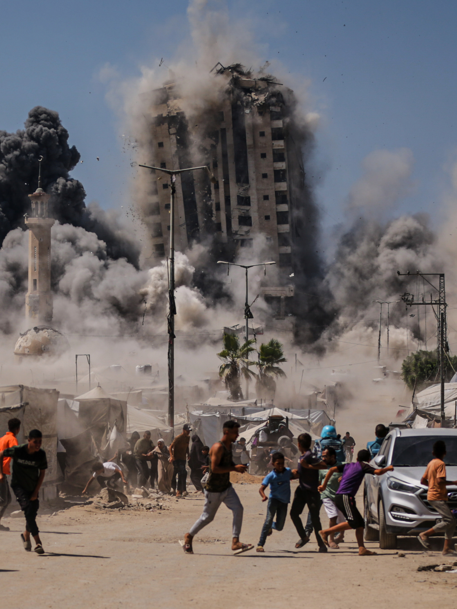 High-rise building in Gaza collapses after being hit by Israel strike