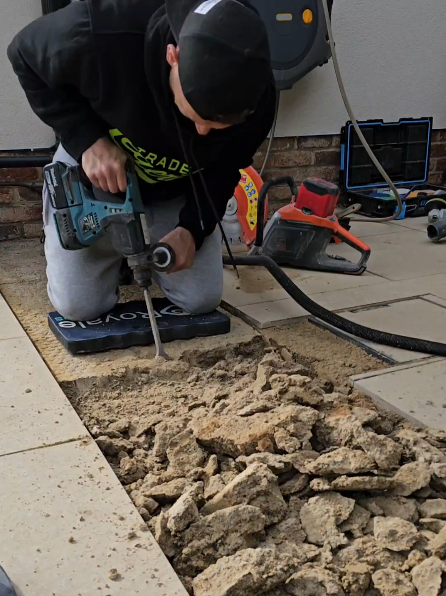 Running conduit for cable under paving #fyp #tiktokk #garden #reels #work 