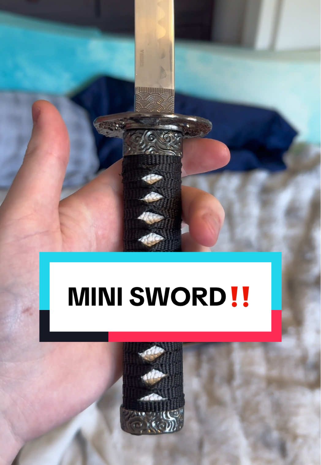 Replying to @← Riot.Eats.Batteries→ This is a mini sword #sword #knife #decoration 