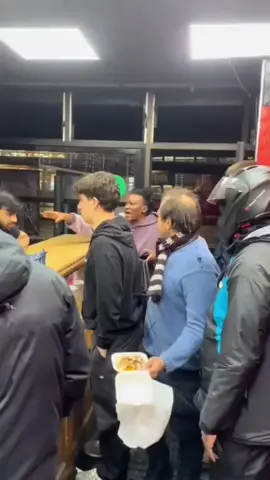 A UK restaurant became the stage for a dramatic clash where a migrant was caught on video demanding other migrants to 