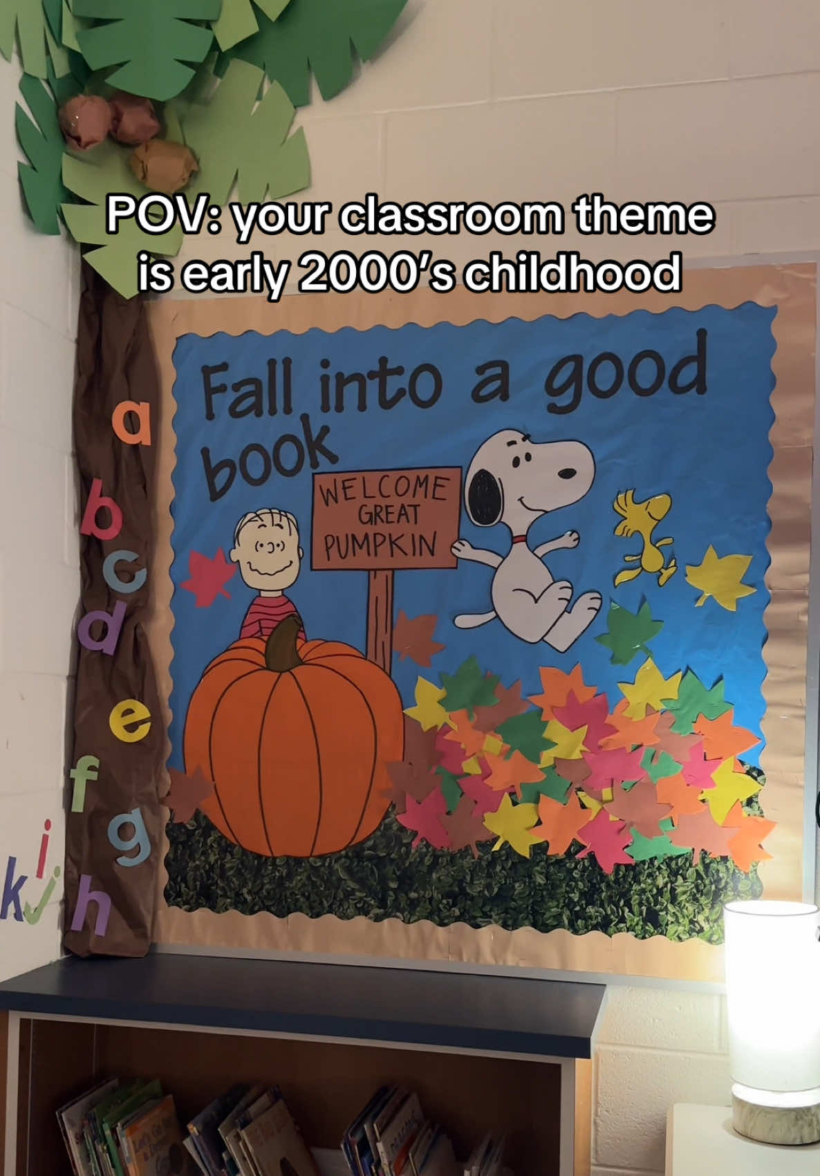 seasonal bulletin board in the reading area is ready for fall🍂 #teacher #firstgrade #teachertok #classroomsetup #fall #peanuts #snoopy #early2000s #childhood #nostalgia 