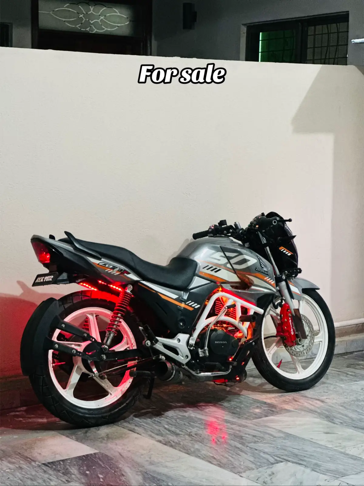 #for sale 🥺•Model: 2025 •Registration city:Lahore  •Registration year:2025 feb  •Engine capacity:150cc •Mileage:6000 •Aftermarket equipments:  Austin racing exhaust  Dead. Drop Fat tyres Extra high throw lights  Front headlight projector installed  Moxi 3 peics handel bar with rizzer  Light Grip assembly installed  Engine cage installed  Fire ket installed  All bike ppf  Rim coloured white  All original parts available  *_1122_*bike number  •Paint condition: 10/10  •Documents: all clear  •Suspension:10/10 •Tyres: fat tyres front 90/90/18  Back 120/90/18 •Accidental condition: Non accidental •Biometric: available on the spot  •Demand💰:550 •Contact📞:03020453481   •Location 📍:Lahore#modification #trending #honda150 #foryoupage 