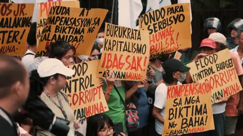 HUWAG NATIN HAYAAN NA MARAMING MALUNOD SA KASAKIMAN AT MANATILING TAHIMIK SA GITNA NG PAG-ULAN NG KORAPSYON, HUWAG NATIN HAYAAN TUMAAS ANG KANILANG NGALAN AT ARI-ARIAN HABANG TAYO AY NANATALI LUMALABAS SA PAGTAAS NG BAHA. LUMABAN. TUMINDIG. BUMOSES. MANINDIGAN. #corruption #floodcontrol #kmjs #fyp 