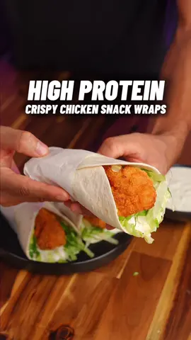 High Protein Crispy Chicken Snack Wraps! 🔥🍗🌯 ONLY 294 calories, 36g Protein! Easy High Protein, meal perfect for those cravings! 😋 Checkout my High Protein Cookbook with 180+ recipes just like this one! (Link in bio)📕👨🏽‍🍳  Makes 3 Wraps 🔥 Calories & Macros 📊 Per Wrap: 294 calories  36g P | 18g C | 8g F   Crispy Chicken  - 400g chicken breast (cut into 3x 130g pieces - I used two breasts and saved the extra for later) - 125g plain (all purpose) flour - 1 tsp smoked paprika - 1 tsp black pepper - 1 tsp garlic powder - 1 tsp onion powder - 1 tsp salt   - 1 egg - tbsp pickle juice - 100g bread crumbs (not all is used - 45g for tracking)   Garlic Sauce - 90g 0% greek yoghurt  - 45g light mayo - 1 tsp garlic paste - Salt & pepper to taste - 1 tsp honey (optional for added sweetness) Snack Wrap Assembly - 1 mini low carb tortilla (brand: mission carb balance tortillas 70 calories each) - 1/3 garlic sauce  - Shredded lettuce  - 1 crispy chicken tender Storage & Heating ♨️ - these are best made fresh but you can pre make all the tenders then refers to get crispy again! Checkout my High Protein Cookbook with 180+ recipes just like this one! (Link in bio)📕👨🏽‍🍳  🏷️ #highprotein #snackwraps #mcdonalds #EasyRecipes #lowcalorierecipes      