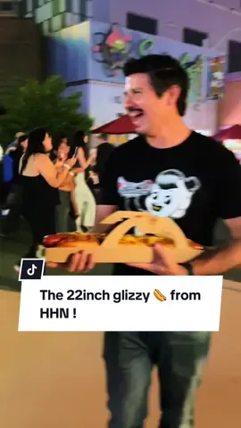 Would you try it??  The 22inch glizzy from @Halloween Horror Nights .  The highlight of the night for sure for @Kevin Frederickson and I , even @Backstitch Bruja was spooked and gooped!  #horrornights #universalstudios 