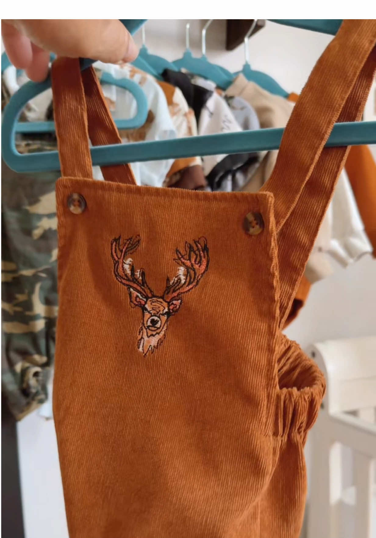 This #babyromper is so stinkin cute! I love the deer and the corduroy fabric. #bubbleromper #babyhunting #huntingandfishing #westernbaby 