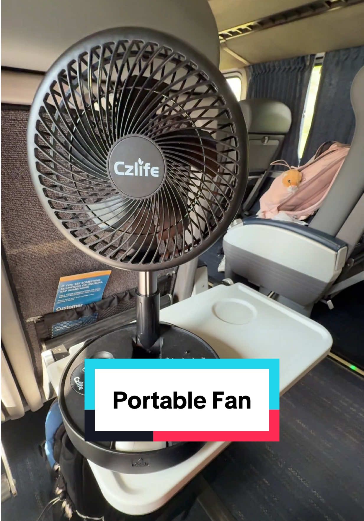 This portable fan has kept me cool on the train and in the hotel room! This way, everyone can be in a temp that they like! #portablefan #tiktokshop #fan #portablefans #cooldown 