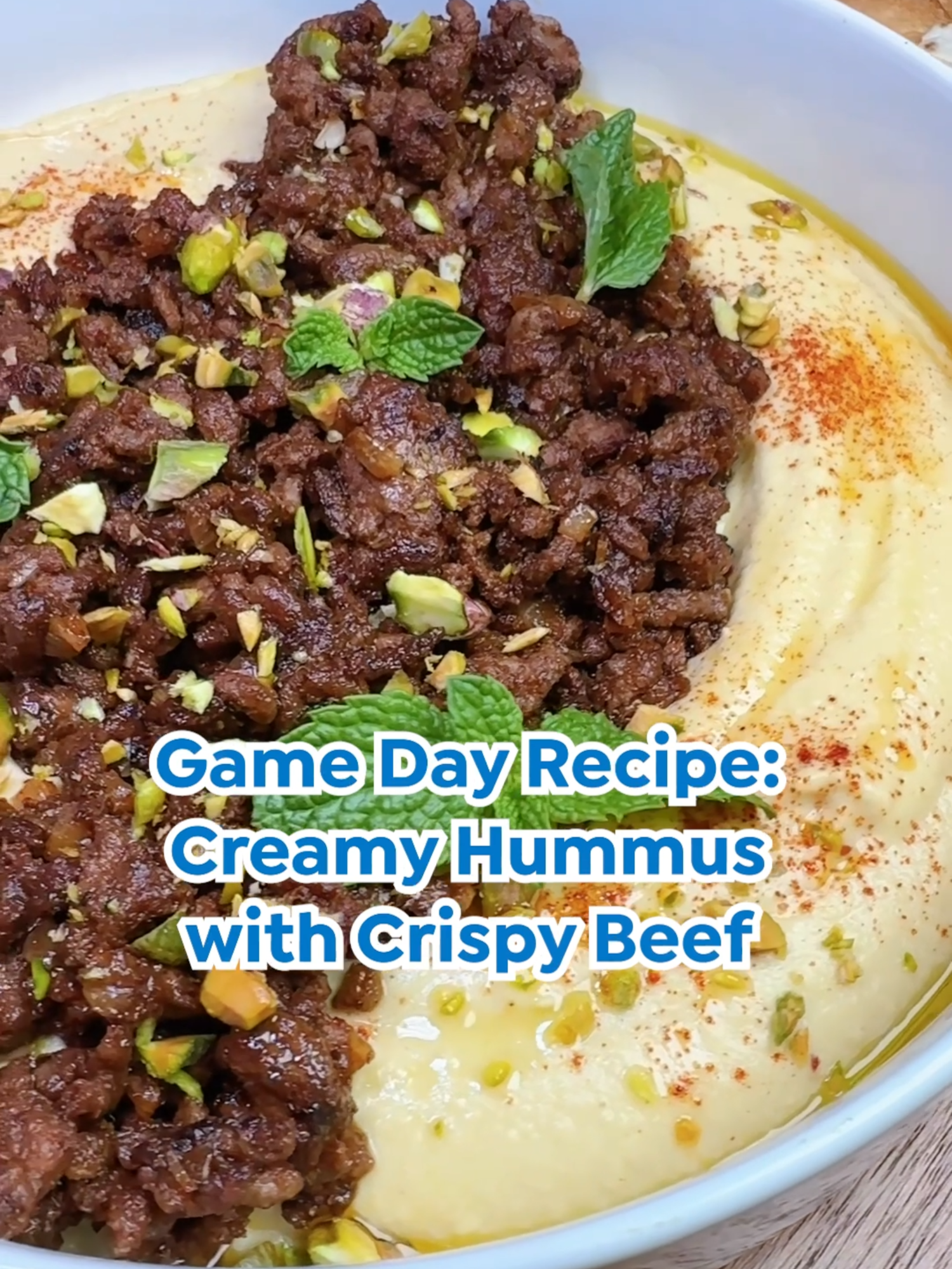 Score a touchdown at your next game day party with @lornamaseko's Creamy Hummus with Crispy Ground Beef recipe 🏈😋  Tap the 🔗 in the bio to shop her collection now. #LoveHSN #Hummus #GameDayRecipes Recipe ⬇️ ✨Crispy Ground Beef: Olive Oil, Onions, Garlic, Ground Mince, Onion Powder, Stock Cube, Worchestershire Sauce, Tomato Paste, Sugar ✨Hummus: Chickpeas, Garlic, Tahini, Lemon juice, Coriander, Salt, Honey, Dijon Mustard, Olive Oil, Ice 🏈 Drizzle olive oil into your skillet, then sauté your onions until light brown. Then add garlic and combine. 🏈 Add your ground mince. Then add your spices, some onion powder, a stock cube, worcestershire sauce, tomato paste and combine that until it looks as delicious as it does. Then add sugar.  🏈 For the hummus, add chickpeas, garlic, some tahini, lemon juice, coriander, salt, honey, Dijon mustard, olive oil, and ice. Blend for beautiful smoothness.  🏈 Plate everything up, and enjoy!