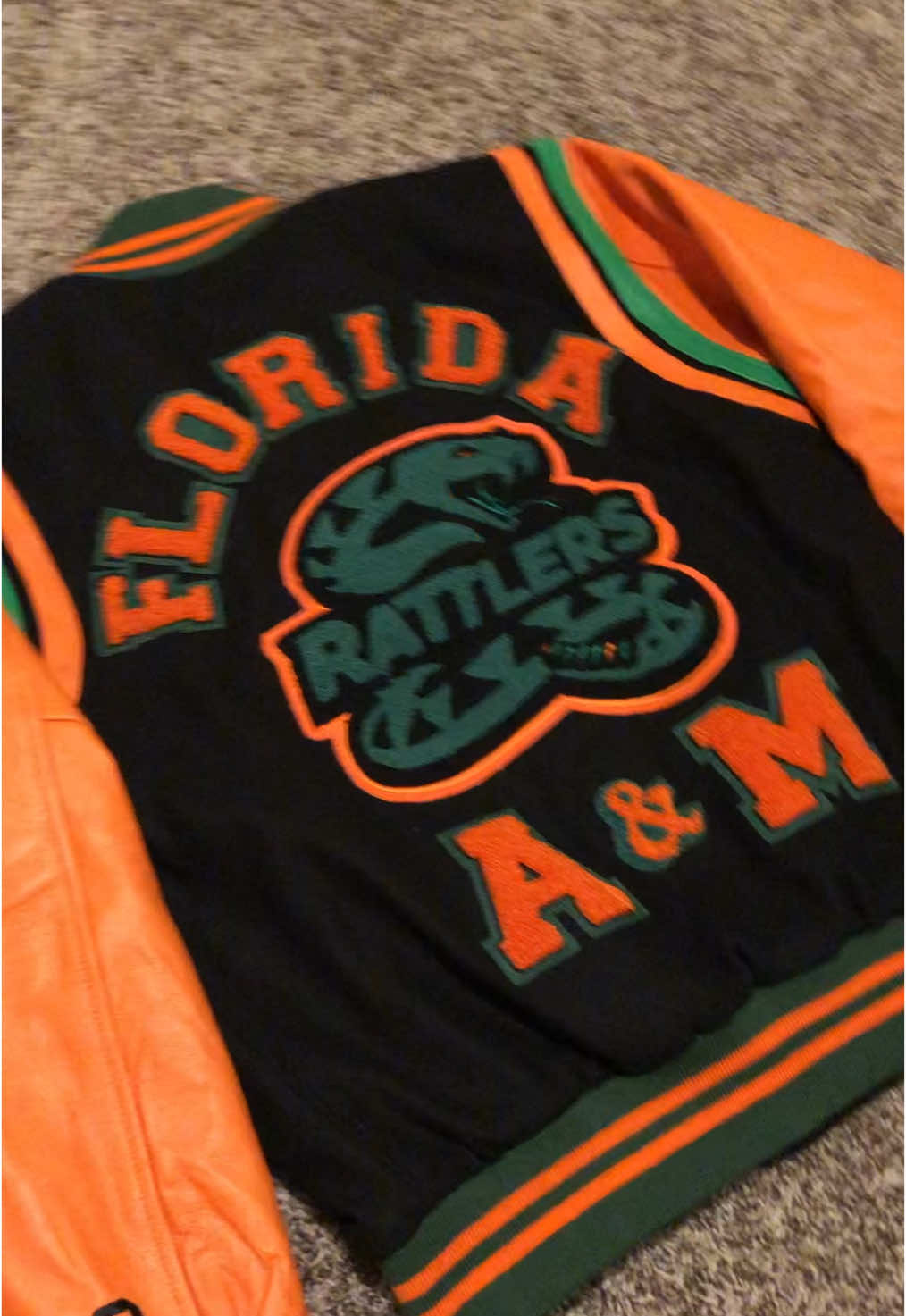🐍 FAM U  Providing all custom designed varsity jackets for all schools & universities this season….. 🪡100% wool and leather with your own custom patch and embroidery details.  👇🏾Drop your school below. 