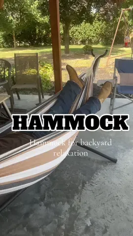 Hammock for backyard relaxation. We all love lounging in the hammock and doom scrolling on tiktok. #hammock #hammocklife #hammocks #relaxtion #outdoorliving 