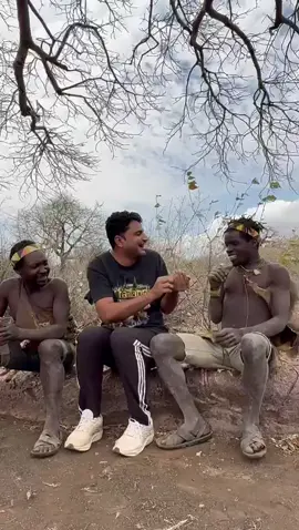 “Biscuits in the wild 🍪🔥” I shared sweet glucose biscuits with my Hadzabe friends 😇. First time tasting it, and they absolutely loved the flavor—sweet, crunchy, and fun to share. Moments like these make me realize how food connects us all 💛. 👉 Full vlog on YouTube 🎥 | Follow for more adventures 🌍 #SweetMoments #TribalLife #Hadzabe #FoodConnectsUs #BiscuitsLove