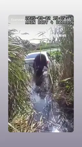 Body camera video released by the Kaufman County Constable's Office on Thursday shows rescuers pulling three children and two women from a car accidentally driven into Lake 