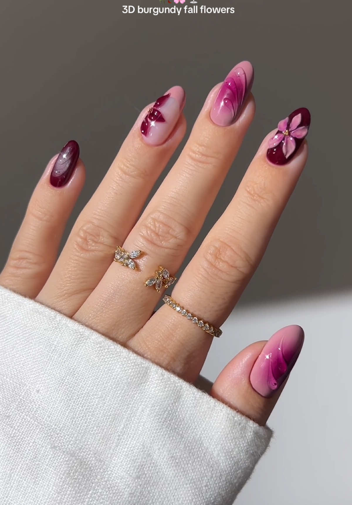 🥀🌸🍷 sculpted petals, deep burgundy, and soft mauve auras ✨ •ad | using @Kiara Sky Professional Nails builder gel Amore | Make Your Mauve | Wine And Only | Top Coat | Flex Gel | 4-in-1 gel nail glue + The Beyond Pro Vol. 3 Lamp Discount code: GREATNAILS  _____ *affiliate #burgundynails #darknails #maroonnails #fallnails #nails dark red 3D nail art inspo 