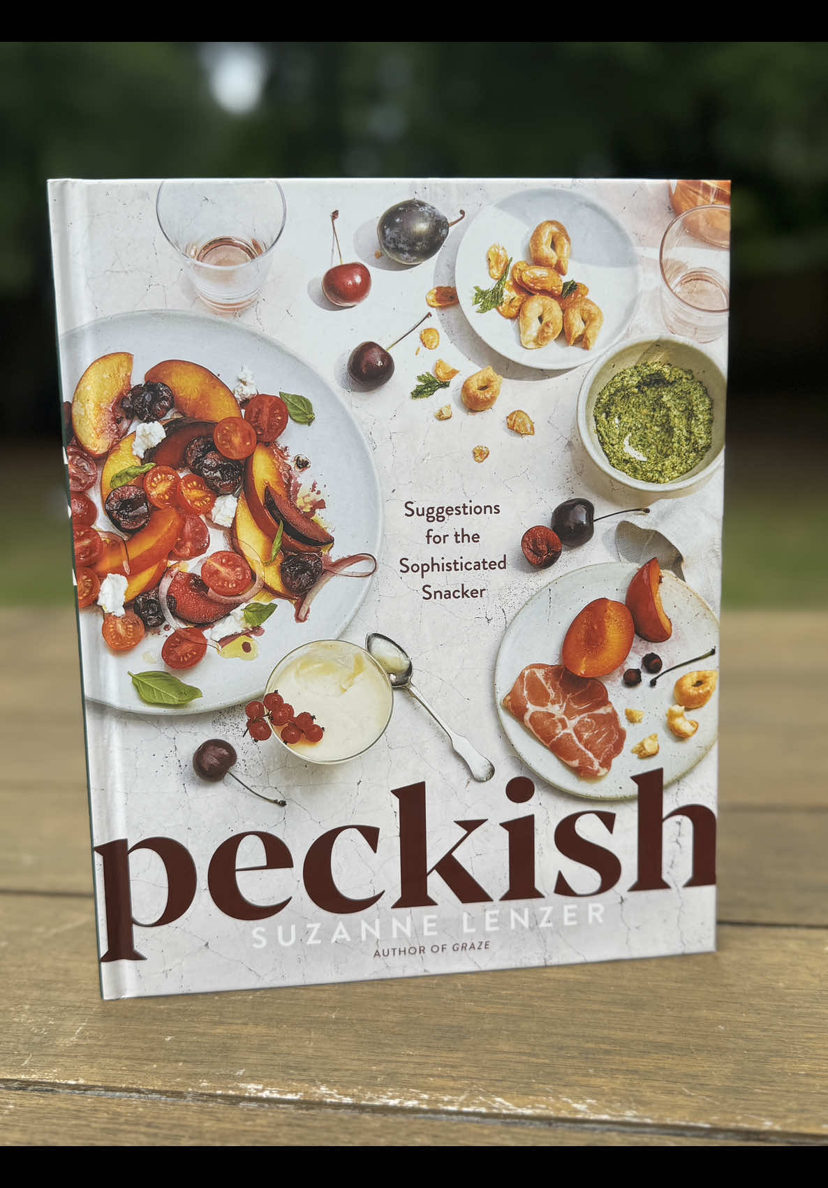 Here is our cookbook preview of “Peckish: Suggestions for the Sophisticated Snacker” by Suzanne Lenzer @sclenzer (Rodale, April 2025) Chapters include:  - On Toast - In Jars - Napkins Only - In Bowls - Skewers and Sticks - One Platter, Many Forks - Baking Sheets and Bread Baskets - A Sweet Spoonful - Coupes, Flutes and Jam Jars This is a charming and beautifully photographed snacks cookbook. There seems to be a photo for every recipe (sometimes two actually) but you might have to turn a page and find it shown on a spread with other dishes.  Ingredients are shown with volume based measurements.  #cookingbooks #cookbookdivas #cookbooktok #cookbooks 