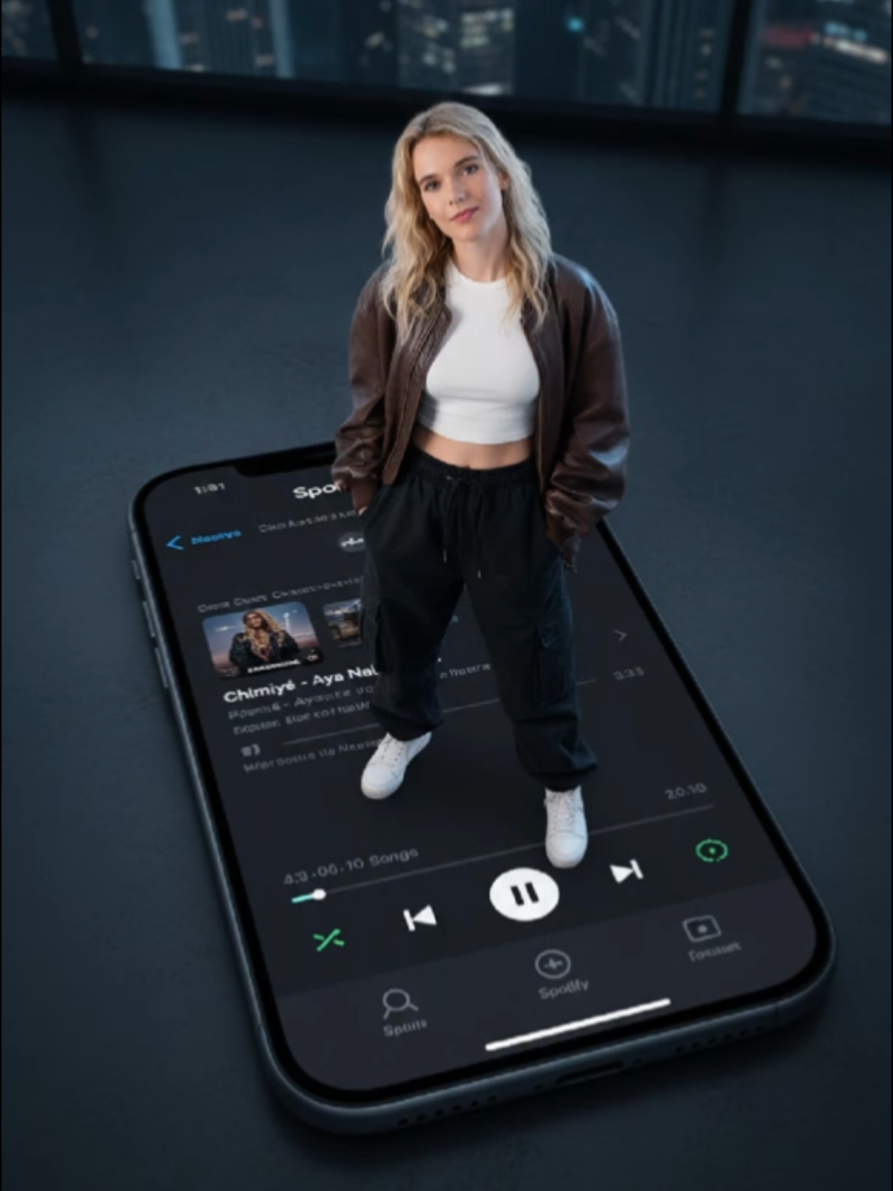 Nouvelle tendance prompt 🍌 Nano Banana👇 #nanobanana #aitrends  #ia #ai  Create a stylish photo of this girl. She stands realistically on the giant screen of an iPhone 16 lying flat on the ground. The iPhone dominates the frame, displaying a Spotify playlist with the song “Chimiyé - Aya Nakamura.” Shot from a high-angle (bird’s-eye view, slightly diagonal), giving a bold urban and modern aesthetic. The model wears a fitted white crop top, low-waist black cargo baggy pants, high-top sneakers, and an oversized leather bomber jacket. The scene is sleek, minimalist, and cinematic.