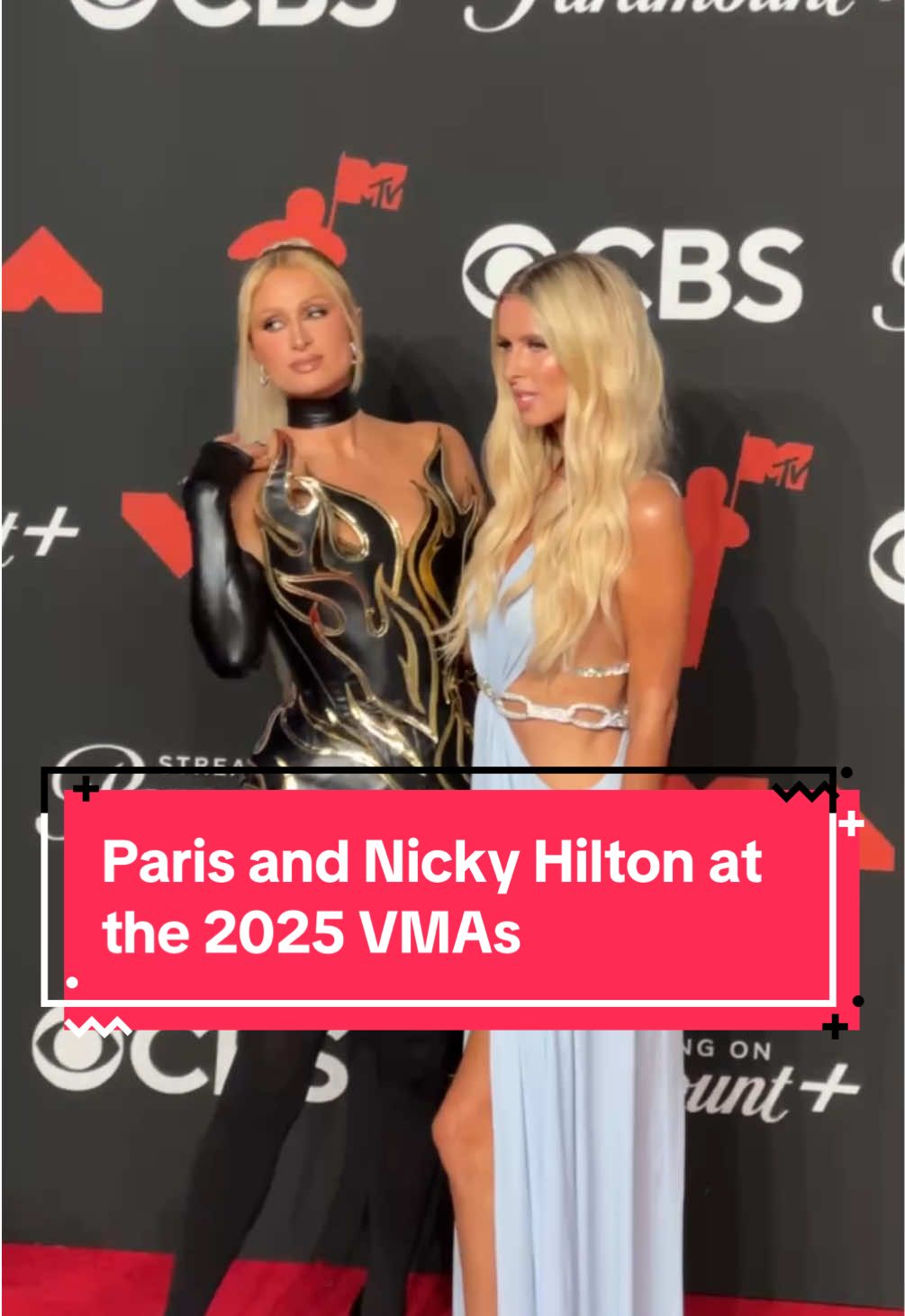 That’s hot! 🔥 #ParisHilton and her sister #NickyHilton have arrived at the 2025 #VMAs red carpet. See more looks from the night at the link in bio. 