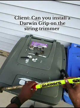 Client installing a Darwin’s grip on the string trimmer. 