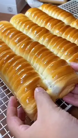 Delicious Sweet Rolls 🥰 dough preparation in the mixer bowl high protein flour 360g instant dry yeast 5g sugar 28g milk powder 25g one large egg fresh milk 200ml knead the dough for 4min add butter 40g + salt 5g knead the dough for 6min rest the dough for 50min separate the dough into 10 pieces make balls cover the dough rest the dough for 25min make the rolls blueberry jam apricot jam pan size 28x28x6 rest the dough for 45min brush with eggs Bake in a preheated oven 175C 25 to 27min  #sweet #bread #Recipe #fyp #balkan 