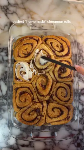 The easiest homemade cinnamon rolls you’ll ever make 🤌🏼 Recipe: Preheat oven to 350°F and grab a 13x9 pan. Place two packs of Pillsbury Grands Cinnamon Rolls in the pan and pour heavy cream along the bottom. Melt 1 stick of butter, stir in brown sugar until it forms a paste, then add cinnamon to taste. Pour mixture over the rolls, cover with foil, and bake for 30 minutes. Uncover and bake another 10 minutes, until golden brown. While still warm, top with the frosting from the pack and enjoy #cinnamonroll #cinnamoroll #EasyRecipe #cinnamonrollrecipe 