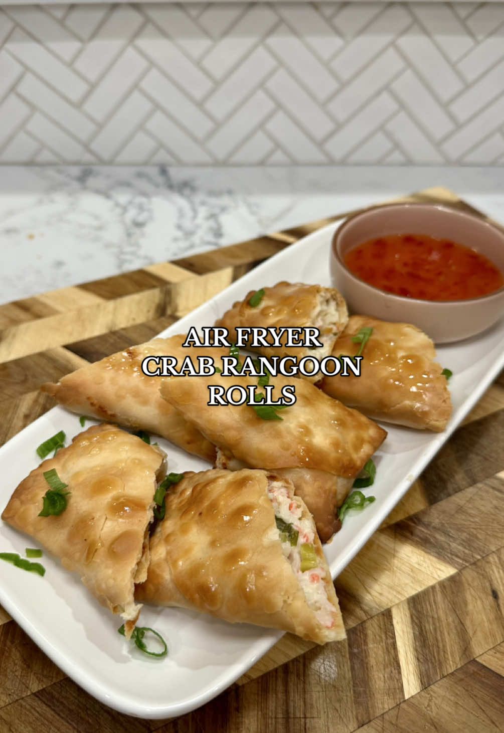 Air Fried Crab Rangoon Rolls 🦀🥯😋 Visit thespicyjuju.com for full recipe❤️ All Crisp No Clog Series - Ep. 5? It’s been so long I forget what episode we’re on but we’re back babyyy 😙 it’s never too late for summer bod lock in 🥲 ENJOY! https://thespicyjuju.com/air-fryer-crab-rangoon-rolls/ #crabrangoon #appetizer #snack #creamcheese #EasyRecipe  