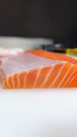 Look at the dense marbling on this salmon belly! 🐟✨ #SalmonBelly #SeafoodSashimi #FreshSalmon #SashimiLovers #SeafoodDelight 