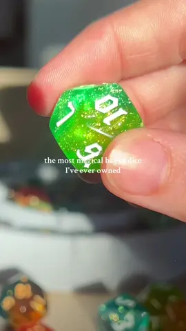 The way these dice shimmer ✨🔮  #dnd #dicegoblin #dungeonsanddragons #diceset #rikkikay 