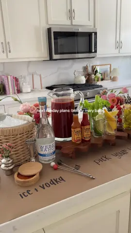 my kind of weekend vibe anddddd a perfect way to kick-off game day season! host your besties with a delish Bloody Mary bar & all the toppings! 🍅🏈 I used craft paper and a @sharpie to label! toppings: celery, lime, lemon, olives, cubed cheese, mozzarella and tomato skewers, peperoncinis, bacon, cucumber spears!  #hostingideas #dinnerparty #hostingtips #footballseason #sundaybrunch #bloodymarybar #bloodymary #brunchideas