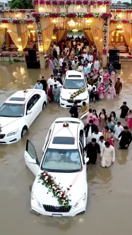 AI flood vlog #FloodedWedding #PakistaniWedding #BaratInFlood #WeddingProcession #MonsoonFloods   
