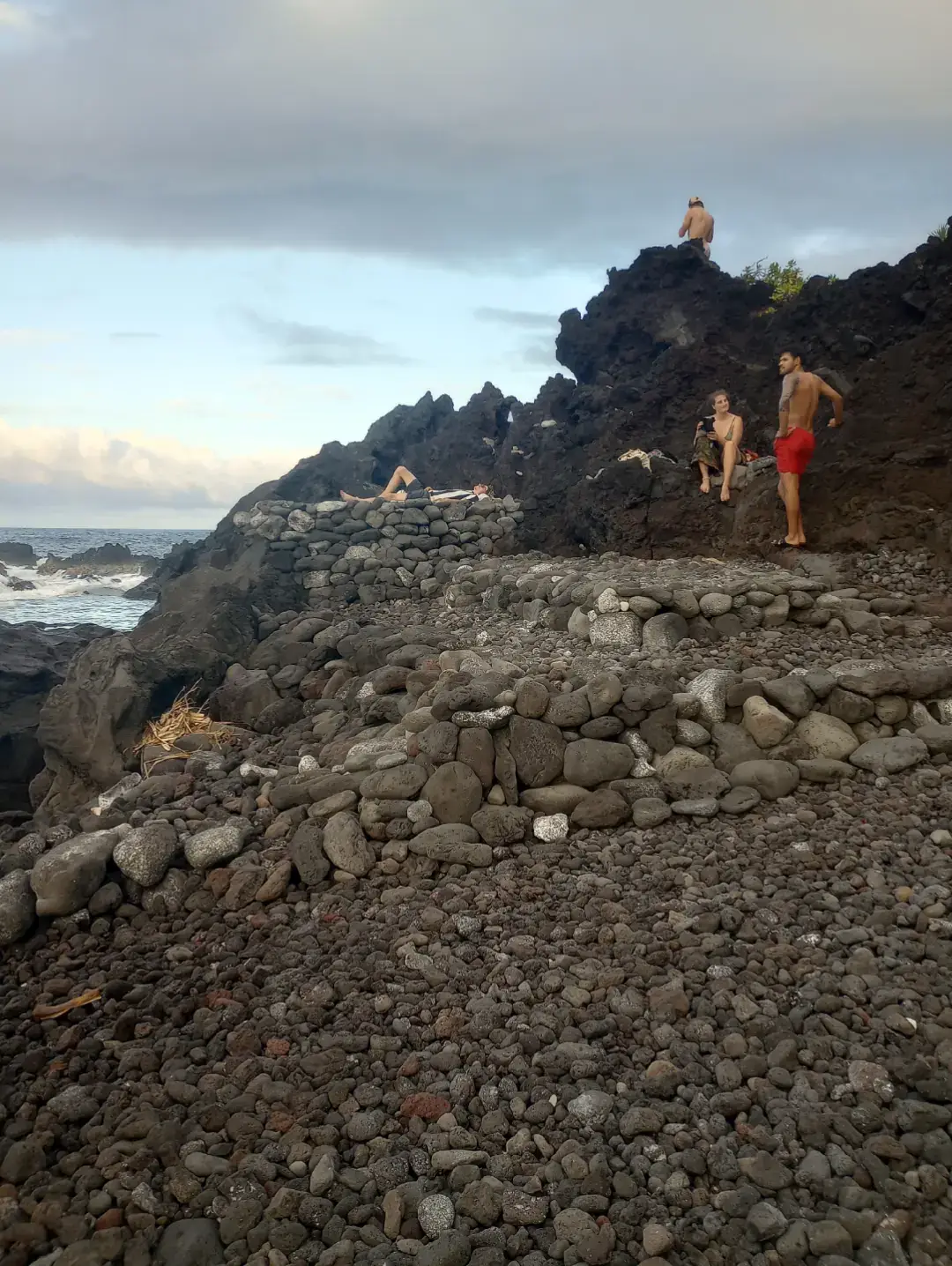 People go directly to my rock stack.  I'll take it as a compliment.  The doods that walked right past me as I worked can think I am weird for taking their picture but I took a walk before taking a picture of the smiley hot chicks.   Moving rocks is a great work out.  Who would like to join me.  The hurricane may move all the rocks. 