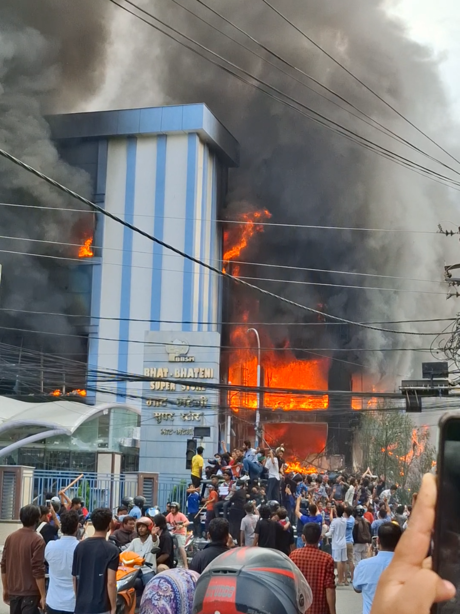 Why all this ?Many buildings including Bhatbhateni were set on fire during Gen Z protests. But our real problem is with corrupt politicians, not with shops, businesses, or public property. Burning buildings will not give us justice it only pushes Nepal 20 years backward. If we continue like this, there is no difference between us and those we used to blame in the past. Instead of destroying, we should unite and fight for honesty, accountability, and a better future. #Nepal🇳🇵 #fyp 