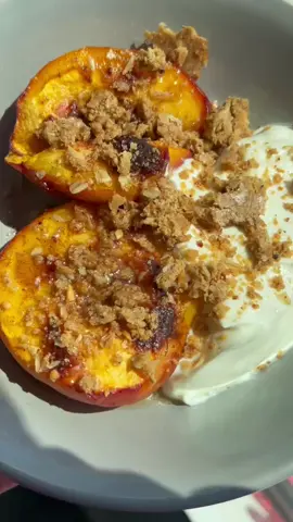 Sweet, simple, and protein packed! 😋🍑 Air fryer peach crumble topped with your favorite G2G Almond Coconut Bar 🥥 Recipe: Cut peach in half and remove pit Sprinkle with cinnamon, and drizzle with honey Airy fry at 350 for 8-10 minutes Crumble with 1/2 of a G2G Protein Bar Top or pair with 1c of Vanilla Greek Yogurt Let us know if you'll give it a try! 👇