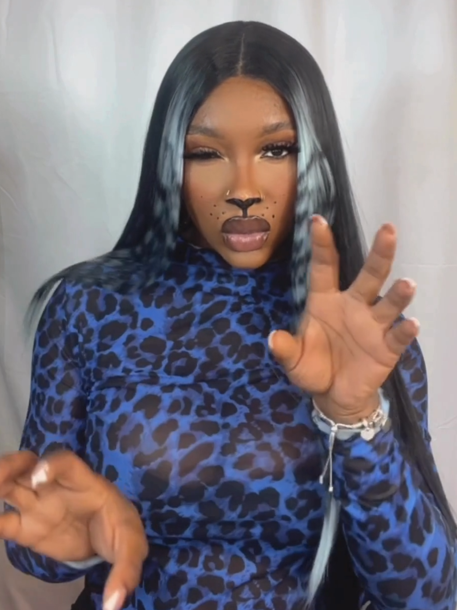 Wig: Outre Tygra in color DRFF Blue Tiger Unleash your inner tiger, perfect for Halloween! #ebonyline #outre #outrehair #OutreColorBomb #syntheticwig #colorfulwig #straightwig #tigerprinthair  #longwig #middlepart #halloween #halloweenideas #DRFFBLUTIG