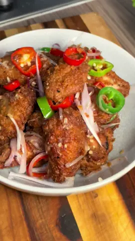 How to make salt and pepper chicken wings  1 kg wings  2 tbsp Shoaxing wine  2tbsp  dark soy sauce  1 tsp Garlic granules  1 tbsp 5 spice 1/2 tsp MSG  1 tbsp Garlic paste  1 tsp Ginger paste Marinate 45 minutes  Flour  mix  Corn flour  Ap / plain flour  Garlic granules  Cayenne pepper  Salt and pepper  Saute   5 garlic cloves  1 shallot  3 jalapeños  green and red  Toss Seasoning mix  1 Tsp msg 1 Tbsp sugar   1/2 salt  1 tsp white pepper Cracked black pepper #EasyRecipe #saltandpepper #wing #chickenwings #buffalowildwings 