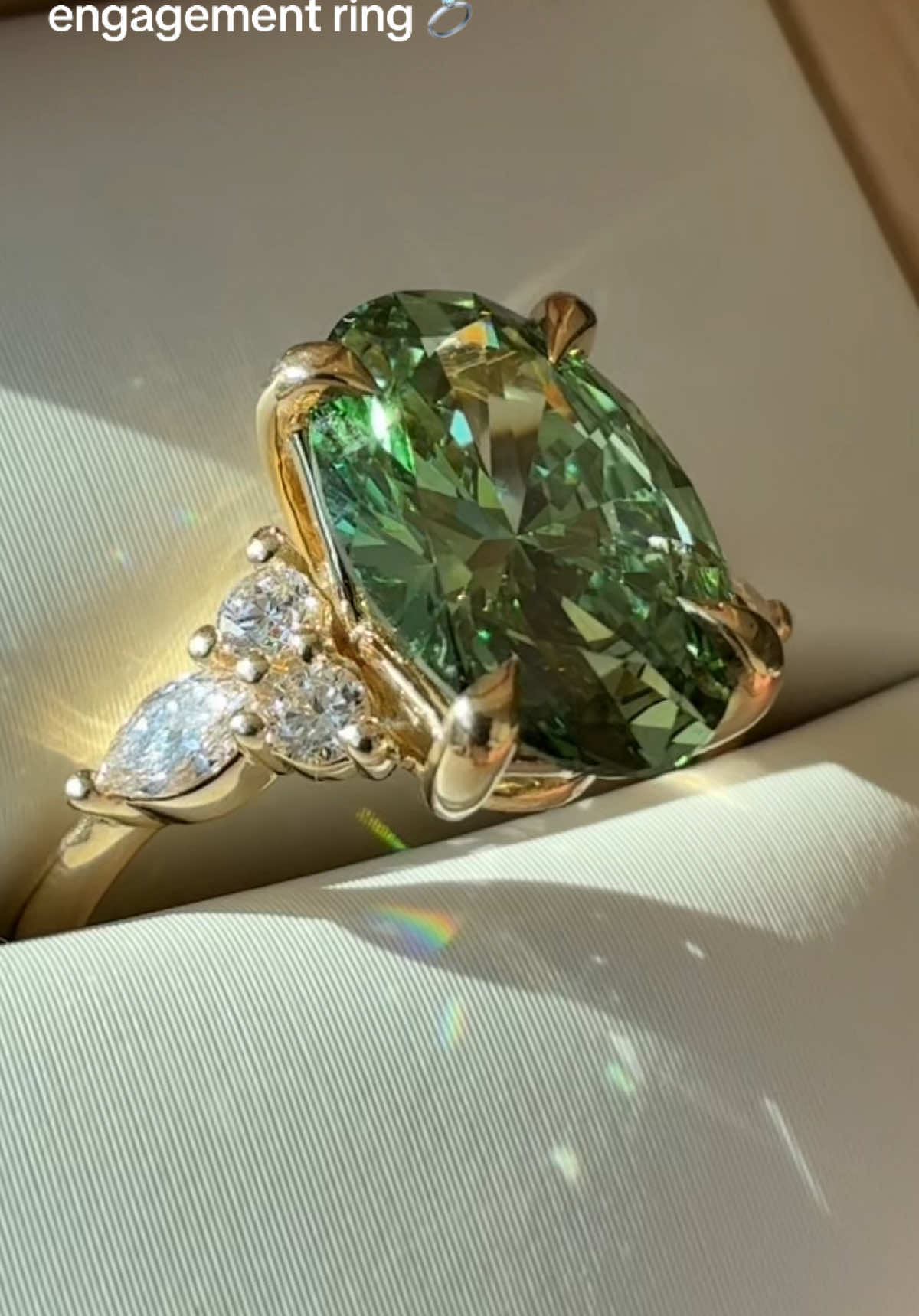 This ring is everything. 💍 Our Nadia engagement ring set with our exclusively created Pacific Green lab diamond. Would you say yes? 💚