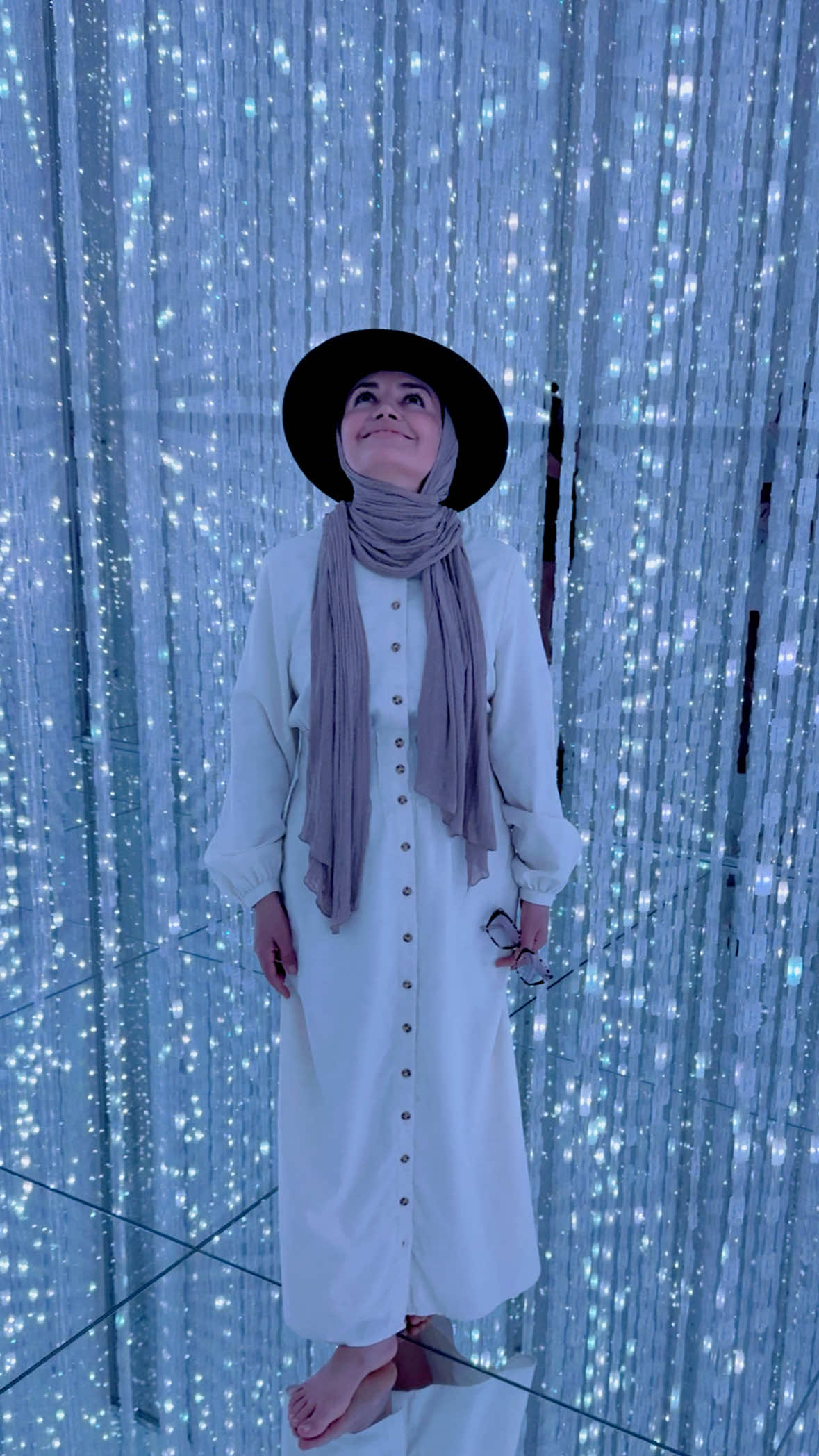 Art isn’t just seen, it’s felt in this digital museum. Picture walking barefoot through mirrored halls, wading through knee deep water, and stepping into surreal rooms that make you feel like you’ve left Earth behind. 🪐🌟 Immersed in a dream at 📍teamLab Planets: 6 Chome-1-16 Toyosu, Koto City, Tokyo 135-0061, Japan 💡 Tips before you go: • Book ahead – Tickets often sell out days in advance, especially on weekends. Official website: https://planets.teamlab.art/tokyo • Timing matters – Arrive earlier than 10 a.m. for fewer crowds and cleaner reflections in photos. • Dress smart – Wear long shorts or leggings you can roll up. Most floors are mirrored or reflective, and you’ll get wet up to your knees. For my Muslimah sisters, long leggings under a dress that you can easily pull up are ideal for modesty and comfort. • Hands free visit - Purses, bags, and anything other than your phone or camera aren’t allowed inside. Lockers are provided for storage. • Baby & toddler tip – Strollers must be stored at the entrance. Bring a baby carrier, as you’ll need to carry your little one for the entire visit but you can leave the exhibitions and access the lockers. • Phone safety – A waterproof pouch is handy if you want to shoot near water features. • Photography tip – Lower angles capture the mirrored illusions beautifully, but be mindful of reflections. • Kids – Great for children, but younger ones may need help in the water sections. Fun fact: The installations change over time, so even if you’ve been before, you’ll always discover something new. 🌸 Would I go again? Absolutely. Just be ready to get your feet (and maybe your soul) a little wet. 😉 #TokyoWithKids #LuxuryTravel #FamilyTravel #JapanTravelTips #JapanItinerary @チームラボプラネッツ / teamLab Planets 