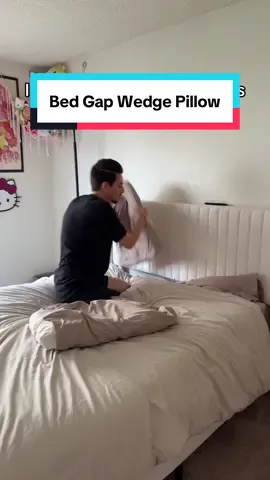 Easiest and comfiest bed gap fix ever! #bedwedgepillow #gapfiller #bedroomhacks #mattress #bedgapfiller 