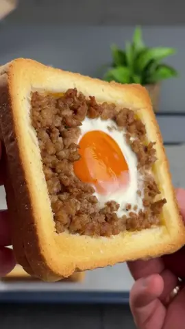 #VNVideoEditor                                              Delicious sandwiches with egg and minced meat.                                              Make Amazing Egg and Minced Meat Sandwiches with This SIMPLE Trick INGREDIENTS: ●Toaster bread - 8 pcs ●Vegetable oil - 2 tbsp. ●Minced meat - 300 g ●Sweet paprika - 1/2 tsp. ●Ground pepper - 1/4 tsp. ●Soy sauce - 30 ml ●Olive oil ●Ketchup - 2 tbsp. ●Cheddar cheese - 4 slices ●Egg - 4 pcs. ●Salt - 1 teaspoon ●Parsley - 10 g  ●Bake in the oven at 180 degrees Celsius for around 12-15 minutes● ●It's incredibly delicious and very simple!!!● Bon appetit! The recipe in your language is available in the description, 💖🇺🇦🇵🇱🇩🇪🇺🇸🇫🇰🇪🇸🇵🇹🇮🇹🇷🇴 🇷🇸🇭🇷🇱🇻🇸🇮🇨🇿🇫🇮🇸🇪🇩🇰🇳🇴 🇯🇵 🇬🇷 🇮🇱🇰🇿🇰🇬🇱🇻🇹🇼 🇵🇪 🇦🇷 🇨🇱 🇻🇪 🇹🇭 🇧🇷                         #sandwich #Recipe #breakfast #simplydeliciousrecipes 