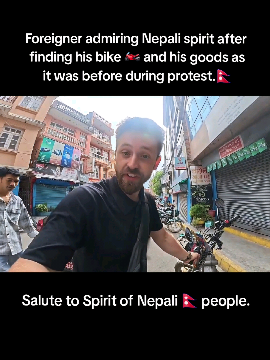 Foreigner admiring Nepali people after finding his bike and all his goods intact after the Protest. Hail Nepal. Thank you for saving our dignity. @wehatethecold #wehatethecold #foreigner #nepalprotest #nepal #genz 