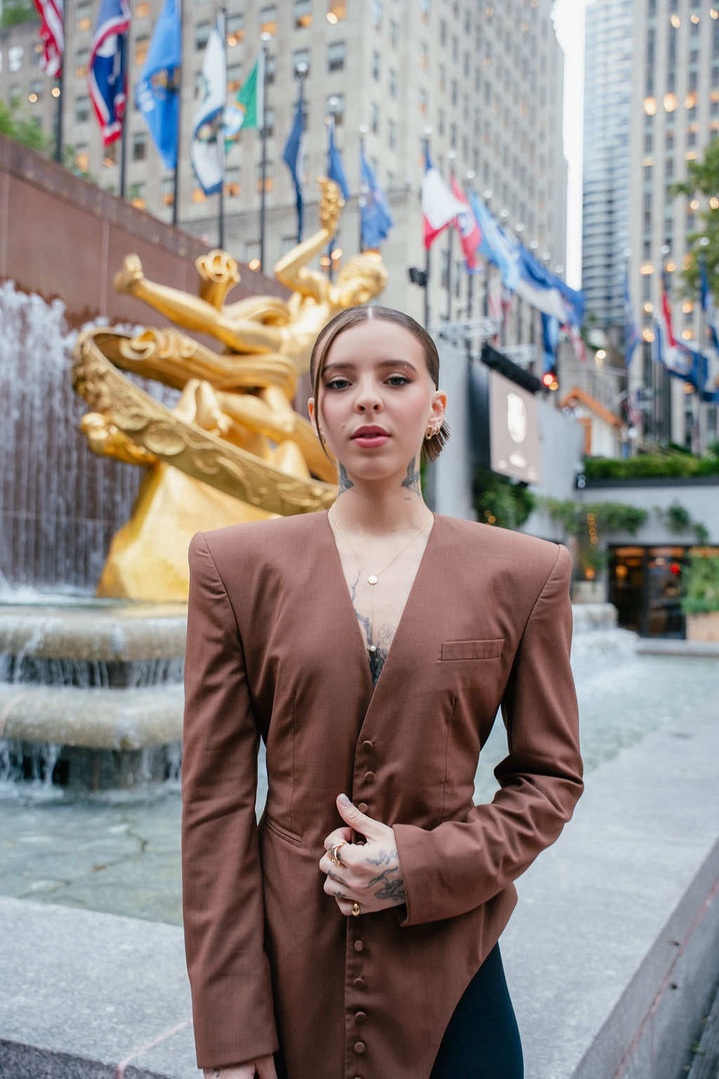 It’s Baby Miko! Global superstar and first-ever Puerto Rican ambassador #YoungMiko brings her high wattage star power as CFDA’s official ambassador to #NYFW Live at @Rockefeller Center and dressed to impress in a full look by #Luar.  We invite you to come watch the streams of all the American collections at the Rock’s iconic Rink and Channel Gardens through September 16.