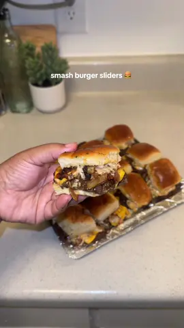 Smash Burger Sliders is the perfect meal for game days, meal prep, late night cravings & more. Tag someone who would demolish this tray !! 🍔🍔 #smashburgers #sliders #gamedayfood #DinnerIdeas 