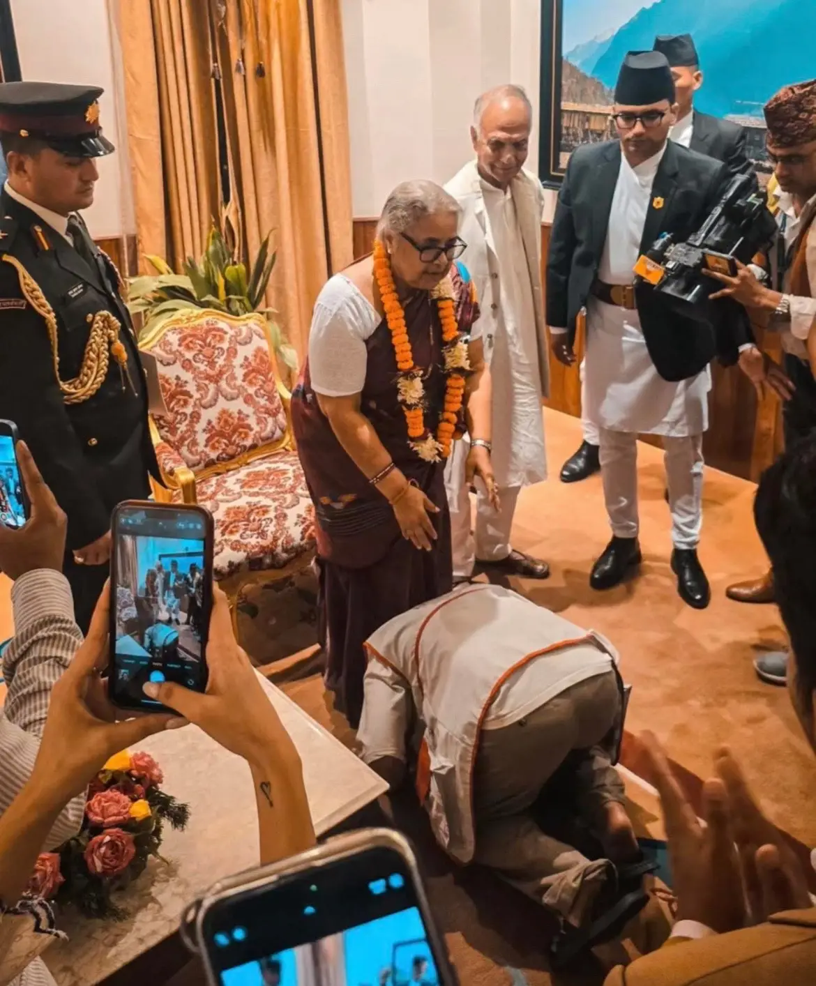 Photo of the day: Sudhan Gurung touches Sushila Karki’s feet. #nepal #sushilakarki