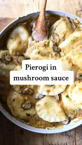 Pierogi with creamy mushroom sauce.  recipe link in bio  🥟🍄‍🟫Pierogi smothered in mushroom cream sauce. A hearty, 20-minute comfort food dinner that’s super easy to make! One of my faves atm, hope you love it!!😮‍💨 https://www.servingdumplings.com/recipe/pierogi-with-creamy-mushroom-sauce/ #cooking #traditional #polish #pierogies #homecooked